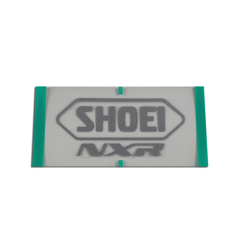 [090120STCMTSLV] Recambio Shoei Logo Posterior Nxr Gris Mate